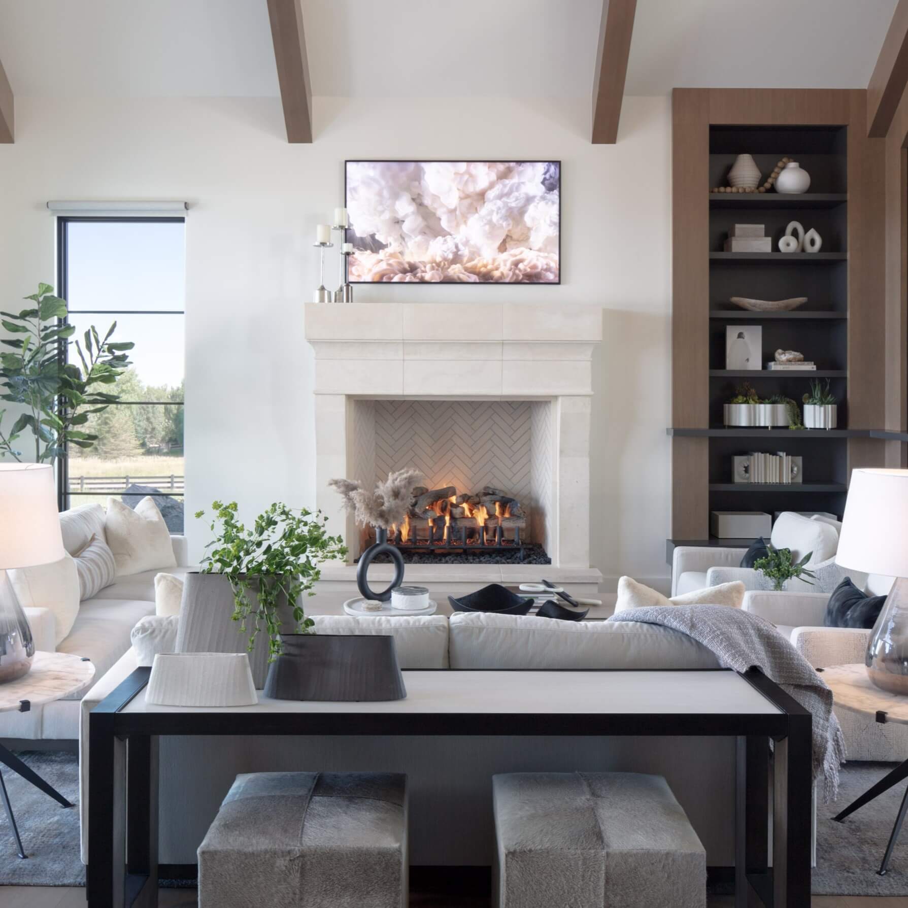 A modern living room with a fireplace and tv.